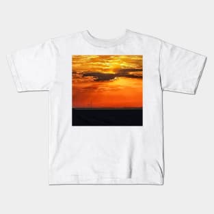 Light exploding from the clouds Kids T-Shirt